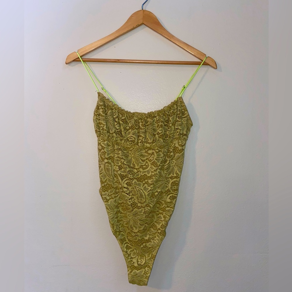 Green lacy body suit